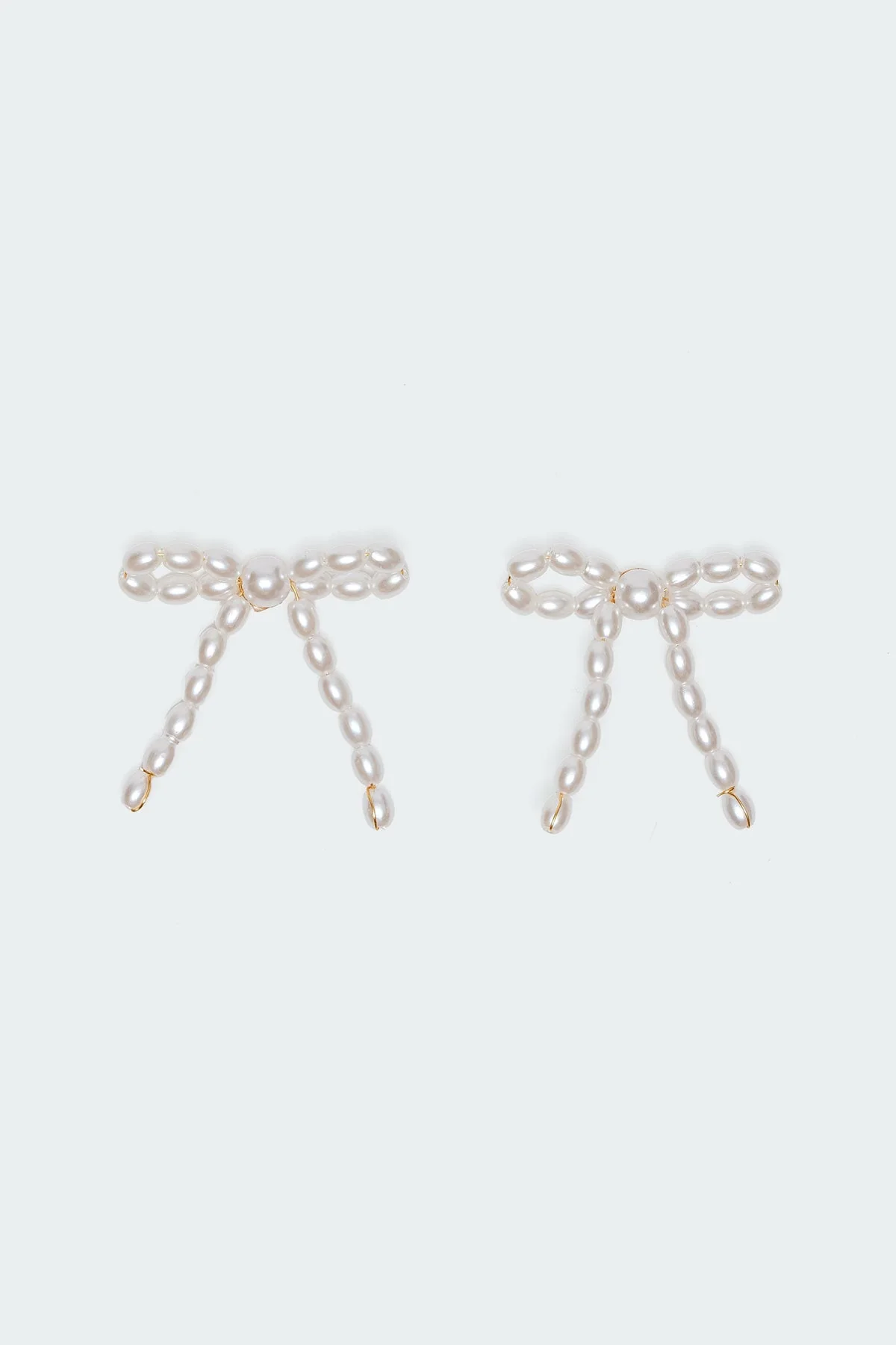 Pearl Bow Stud Earrings - Image 2